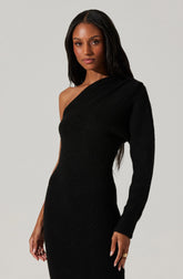A woman is wearing a black, form-fitting dress with a one-shoulder design. The dress appears to be made of a textured, knit material. One sleeve is long, covering the arm, while the other shoulder is exposed.